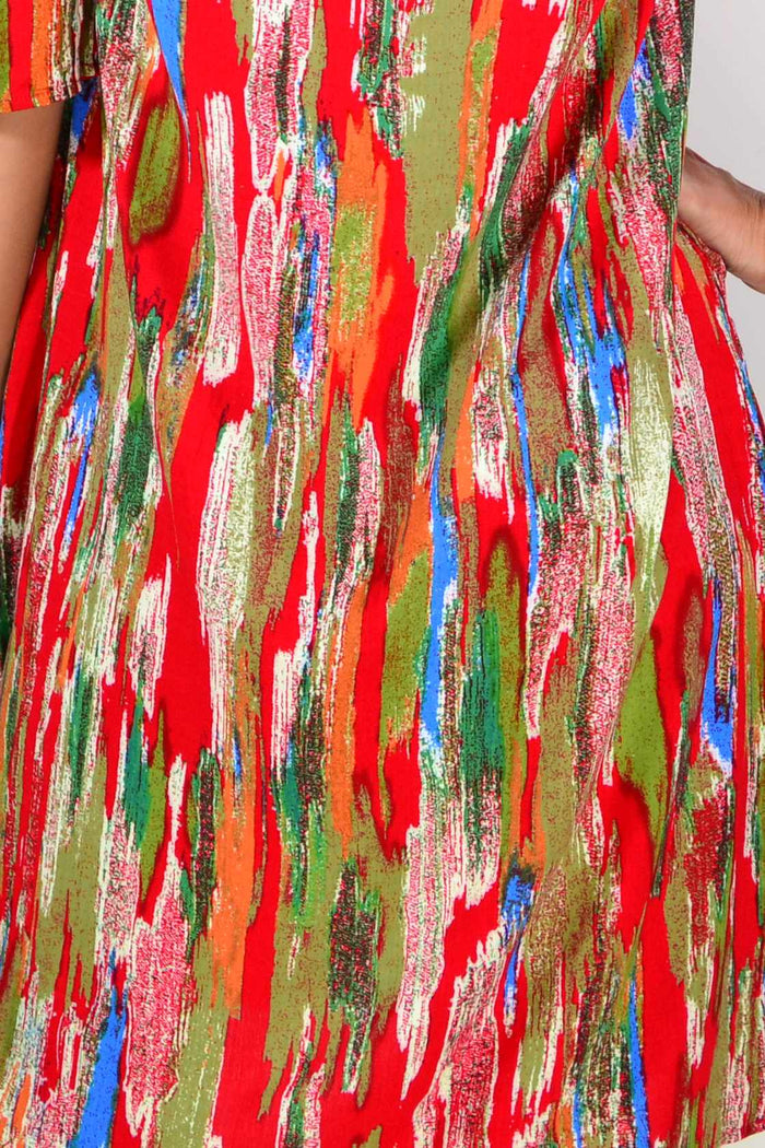 Hourglass Shades of Red Tunic Dress displayed on a hanger, featuring vibrant red fabric and a relaxed fit style.