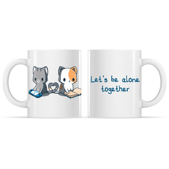 Ceramic Mug_TeeTurtle Let's Be Alone Together white mug featuring a cat playing video games, and a cat reading a book with their tails forming a heart between them.